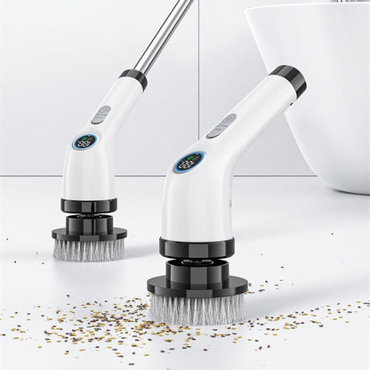 Cordless electric spin scrubber with extension handle cleaning a bathroom floor